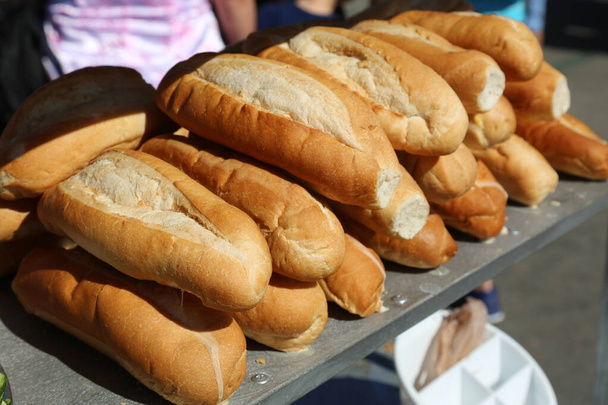 Fresh Baked French Bread at an outdoor market  - Photo, image