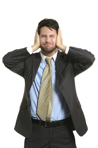 Businessman closing his ears - Foto, afbeelding