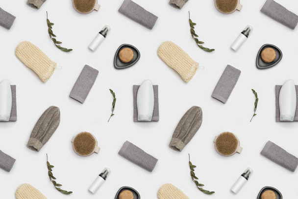 Seamless Pattern with bath accessories from natural material, zero waste set for bathroom, grey soft towel, bottle for gel or shampoo, soap, wooden hairbrush, washcloth - Photo, image
