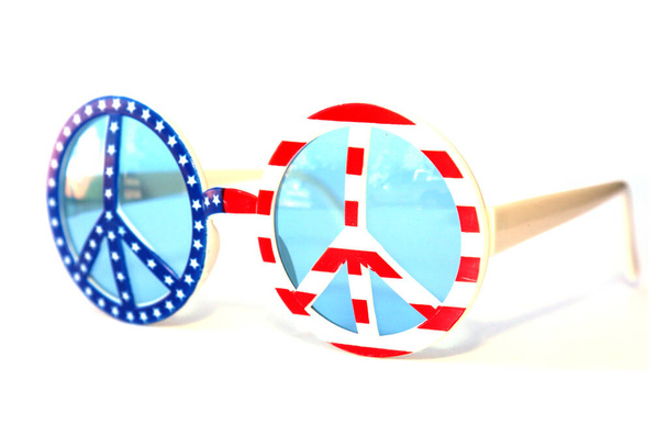 USA Flag Peace Sign Sun Glasses. Peace Sign Fashion Sunglasses. Isolated on white. Room for text.  - Fotó, kép