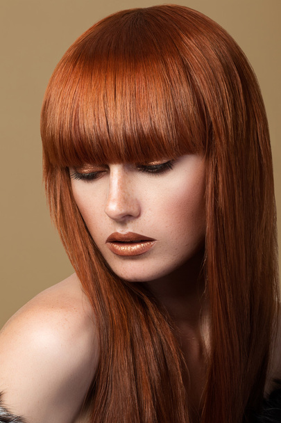 Red haired girl looking down portrait - Fotografie, Obrázek