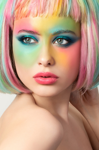 Portrait of young woman with funny make-up - Фото, зображення