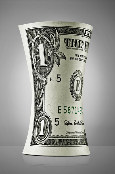 Rolo de dólares com recorte
 - Foto, Imagem