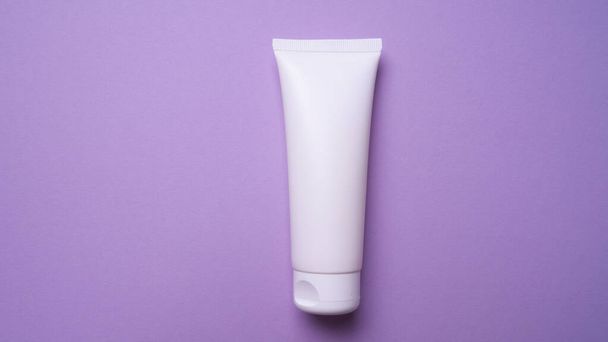 packaging of hand or face cream on pink background - Foto, immagini
