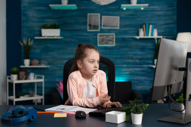 Smart pupil feeling sad and bored of online school - Photo, Image