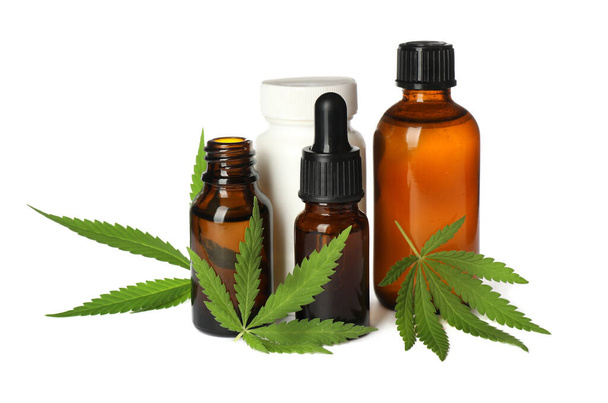 CBD oil, THC tincture, pill bottle and hemp leaves on white background - Foto, immagini