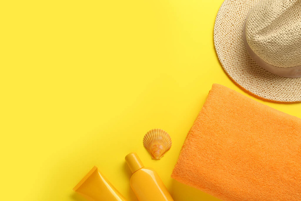Flat lay composition with different beach objects on yellow background, space for text - Foto, Bild