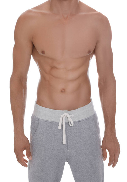 Shirtless man with slim body isolated on white, closeup - Foto, Imagem
