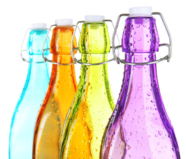Colorful bottles isolated on white - Photo, image