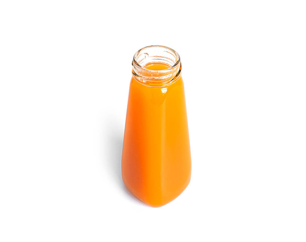 Orange juice in bottle isolated on a white background.  - Photo, image