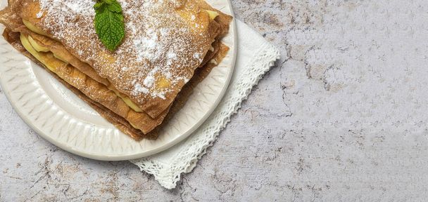 Homemade arabic cake with filo pastry and pastry cream from above. Arabic food - Фото, изображение