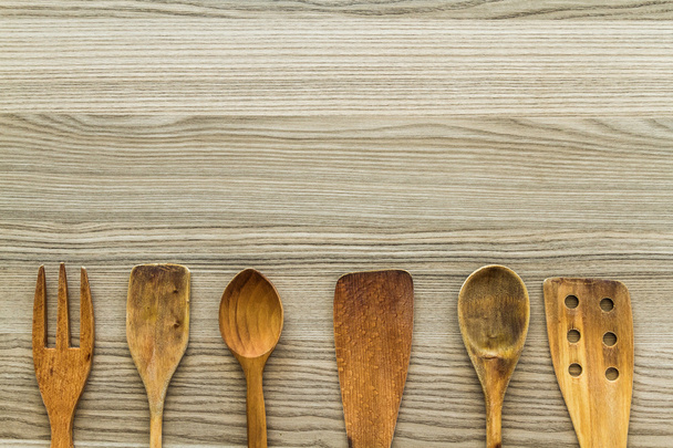 Kitchen wooden utensil of scapula, spoon and fork  - Fotoğraf, Görsel
