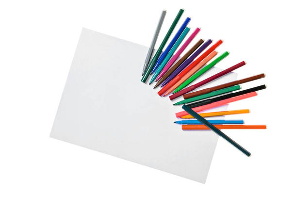 Blank paper sheet and colorful markers on white background - Photo, Image