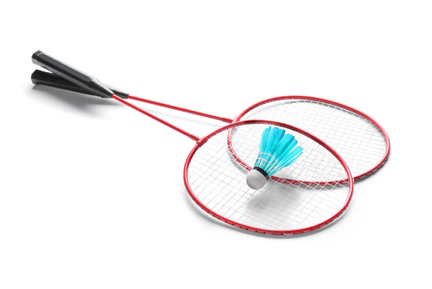 Badminton rackets and shuttlecock on white background - Photo, Image