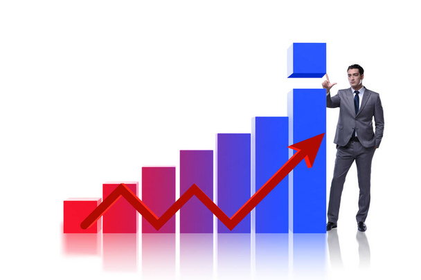 Бизнесмен поддерживает экономический рост на графике - Фото, изображение