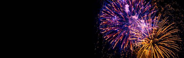 Holiday Fireworks at New Year Eve. Abstract Festive background with fireworks sparkles. Copyspac - Foto, Bild