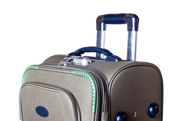 Modern convenient suitcase on castors on a white background - Zdjęcie, obraz