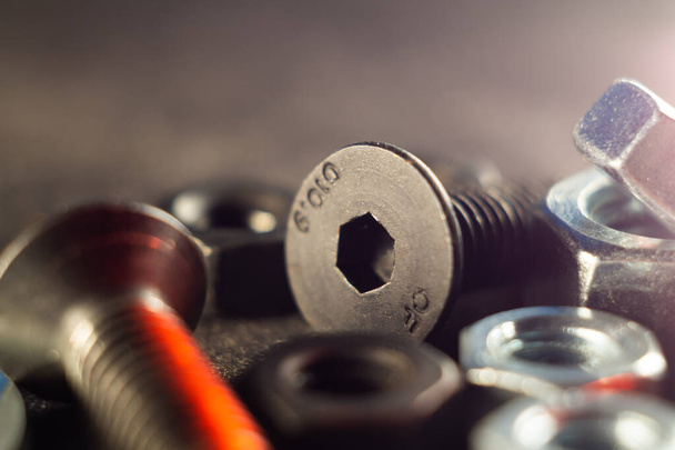 A closeup shot of metal screws and bolts - Φωτογραφία, εικόνα