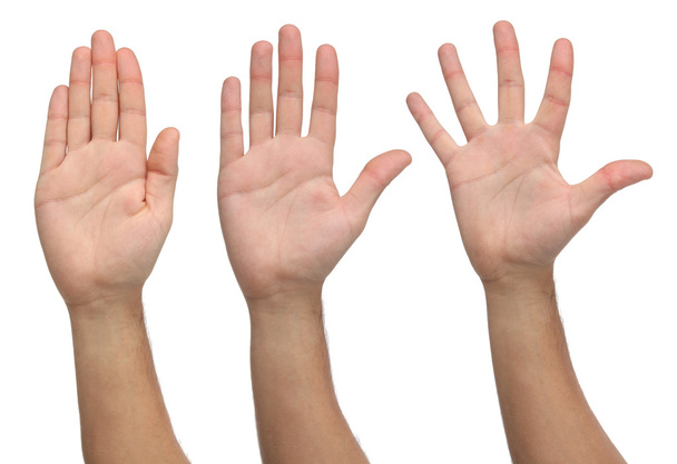 Τρία ανοιχτά χέρια σε διαφορετικές στάσεις. Απομονωμένα σε λευκό φόντο - Φωτογραφία, εικόνα