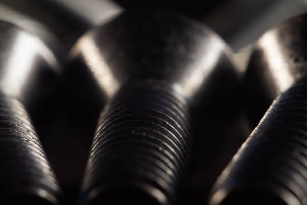A closeup shot of metal screws and bolts - Foto, imagen