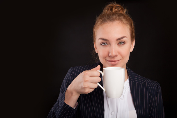 Woman drinking coffee with cup - Foto, imagen