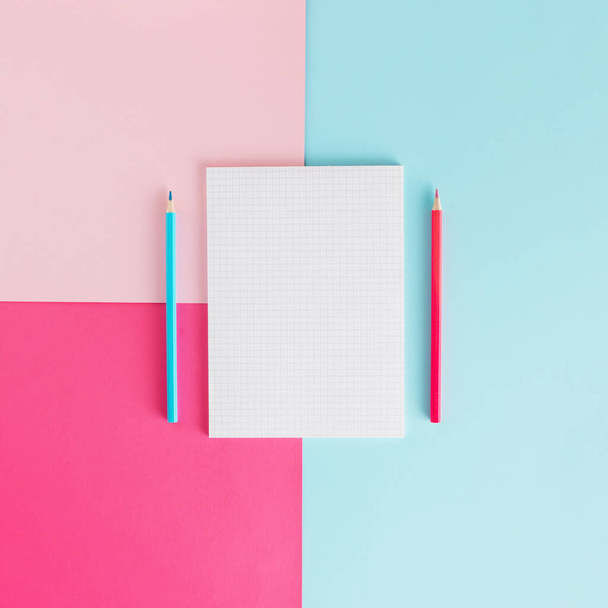 Back to school arrangement made of school things on the pink and blue background. School and office inspiration. Minimal flat lay concept with copy space. - Photo, Image