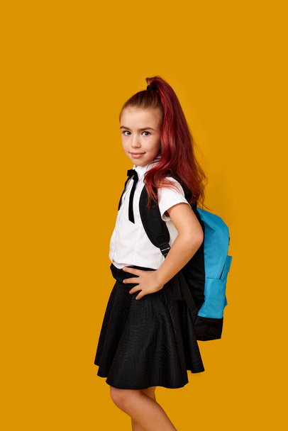 adorable schoolgirl with backpack. Back to school - Photo, image