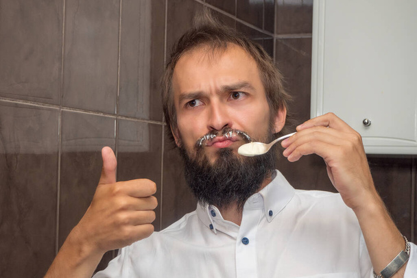 The cook tried sour cream - the moustache is smeared and it has an aftertaste - Фото, зображення
