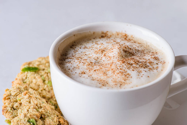 coffee in a mug with milk and cinnamon. High quality photo - Fotoğraf, Görsel