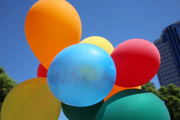 Balloons. colorful helium balloons with a blue sky - Foto, Imagem