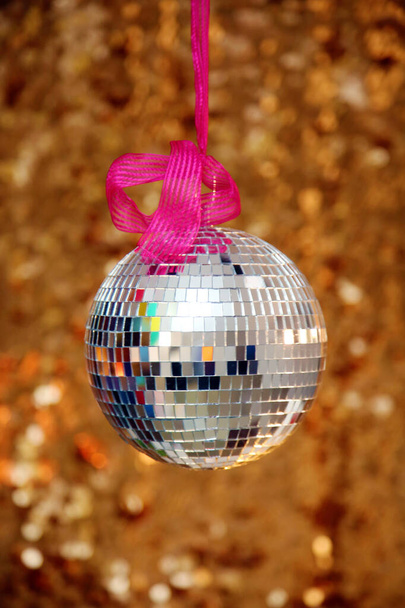 Silver Mirror Ball with Gold Sequin Background. Disco Ball with Gold backdrop. Disco Party. Dance Party. - Fotoğraf, Görsel