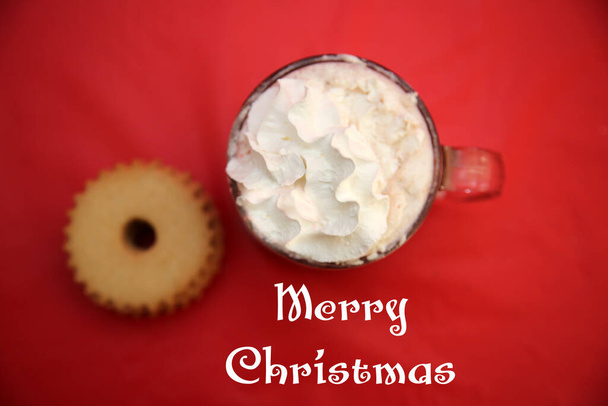 Cookies for Santa Claus. Fresh Baked Cookies and Hot Chocolate with Marshmallows left on a table for Santa Claus. A gift for Santa on Christmas Eve. cookies and milk for Santa Claus, Christmas concept, seasonal celebration. festive family tradition.  - Foto, Imagen