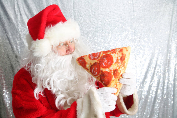 Santa Claus. Santa Enjoys a Slice of Pizza. Santa Loves Pizza. Food and Drink. - Fotoğraf, Görsel