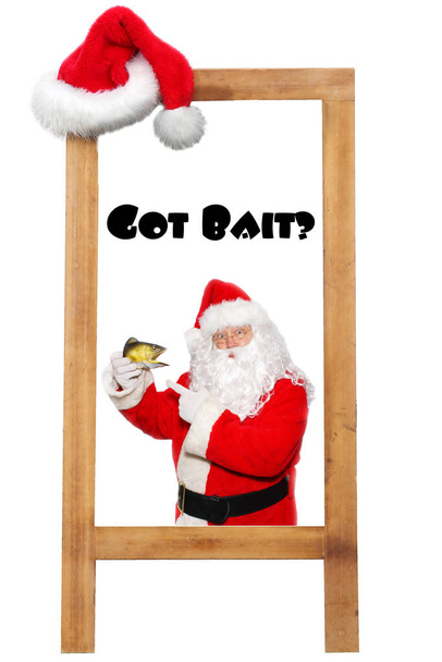Advertising Sign. Advertising sign with Santa Claus, Text and a Santa Hat. Isolated on white. Room for text. Santa is easily replaced with your text or image.  - Foto, afbeelding