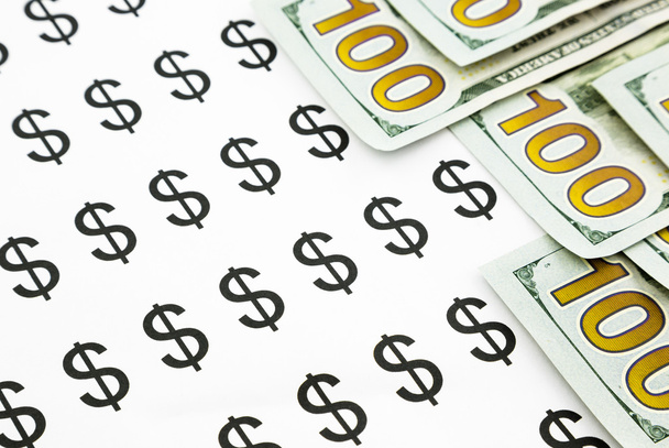 σύμβολο του δολαρίου και χρήματα τραπεζογραμματίων - Φωτογραφία, εικόνα