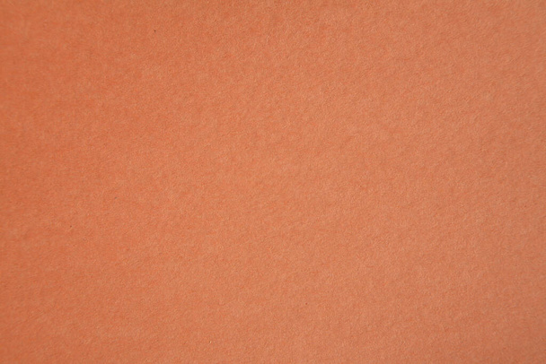 Bouwpapier. macro shot of extreme close-up van gekleurd bouwpapier. ambachtelijk papier met textuur, vezels, gebreken en nog veel meer. Gekleurd bouwpapier. Achtergronden, achtergronden en texturen. - Foto, afbeelding