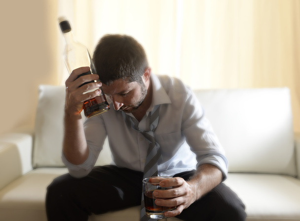 drunk business man wasted and whiskey bottle in alcoholism - Photo, Image