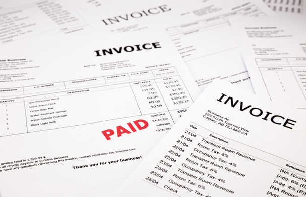 invoices and bills with paid stamp  - Photo, Image