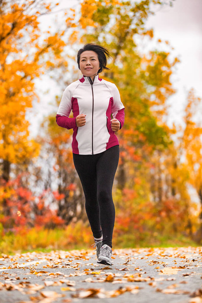 Autumn healthy middle aged mature woman exercising - Fotografie, Obrázek