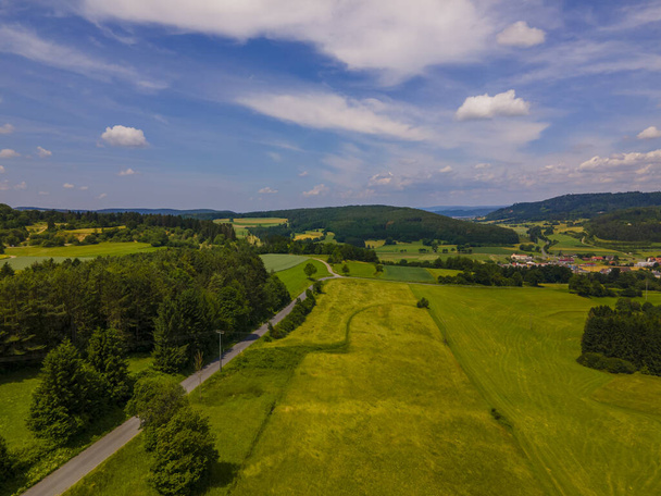 A landscape of farm lands on a sunny day - Fotó, kép