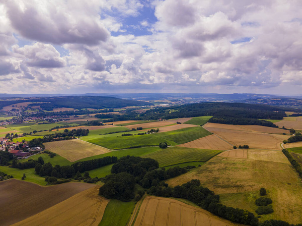 An aerial landscape of fresh farm lands - Foto, imagen
