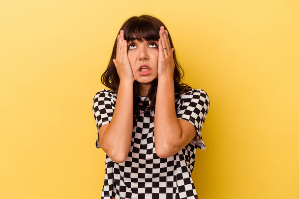 Young caucasian woman isolated on yellow background whining and crying disconsolately. - Photo, Image