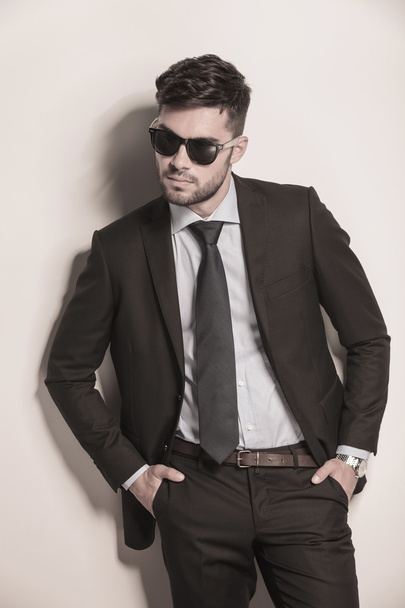 Fashion model in suit and tie looking cool - Photo, Image