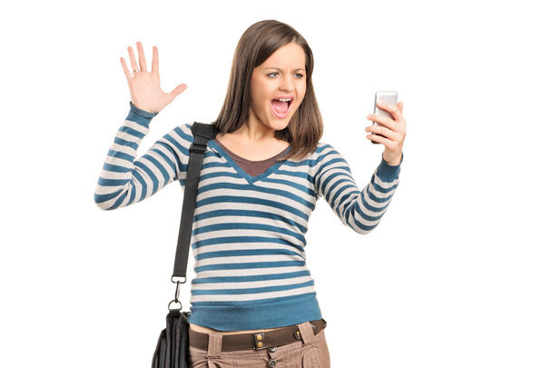 Girl looking at cell phone - Photo, image