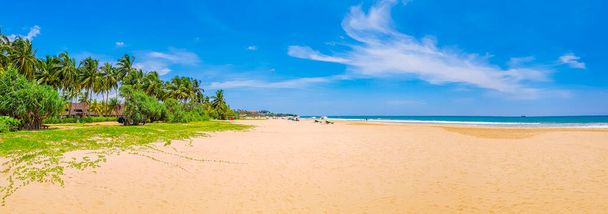 Beautiful sunny landscape panorama from Bentota Beach on Sri Lanka island. - Фото, зображення