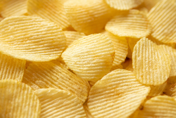 papas doradas crujientes papas fritas snack textura fondo - Foto, imagen