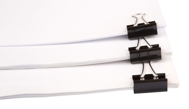 Binder clips with white paper over white background - Fotó, kép