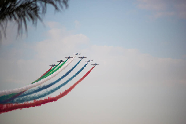 UAE, Dubai - Dec 11,2015 :Airplanes on airshow. Aerobatic team performs flight at air show - Photo, Image