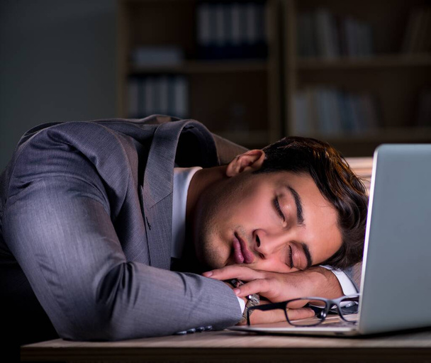 Man staying in the office for long hours - Photo, Image