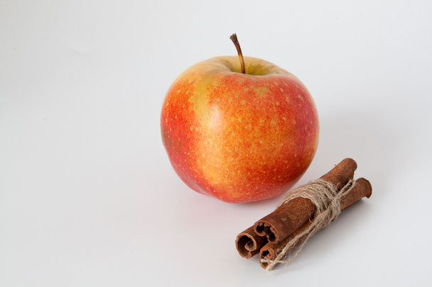 Apple and cinnamon sticks - Fotó, kép